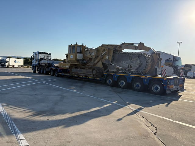 Carga de maquinaria pesada TT2500C Carga de zanjadora TT2500C sobre góndola para transporte especial de maquinaria pesada